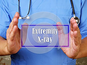 Medical concept about Extremity X-ray with inscription on the piece of paper