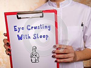 Medical concept about Eye Crusting With Sleep with inscription on the page