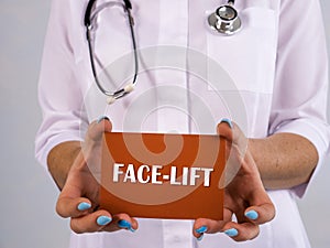 Medical concept about FACE-LIFT rhytidectomy with inscription on the sheet