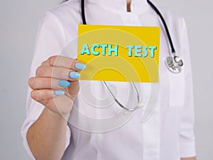 Medical concept meaning Adrenocorticotropic Hormone ACTH TEST with inscription on the piece of paper photo