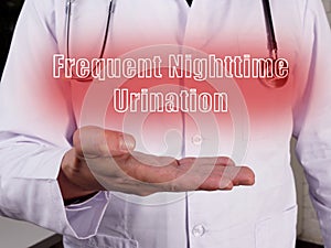 Medical concept meaning Frequent Nighttime Urination with inscription on the sheet