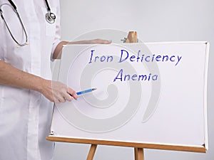 Medical concept meaning Iron Deficiency Anemia with phrase on the page photo