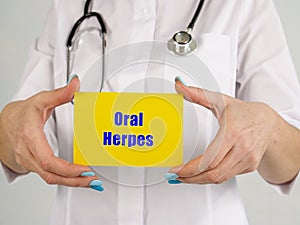 Medical concept about Oral Herpes Cold Sores with inscription on the piece of paper