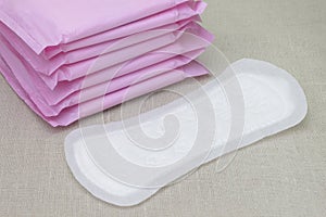 Medical concept photo. Menstrual woman pads for blood period. Menstruation sanitary soft pads, hygiene protection. Woman critical