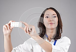 Medical Concept: Professional Female Caucasian Doctor Holding an