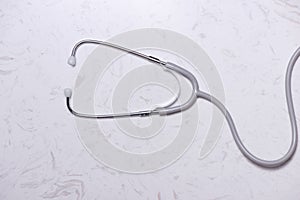 Medical concept Stethoscope and paper note on table background