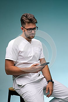 Medical consultation and healing online. Male doctor physician messaging with patient, prescribing treatment