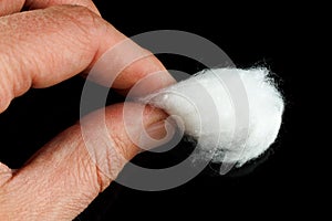 Medical cotton wool in hand