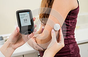 Medical device for glucose check. Continuous glucose monitoring pod.