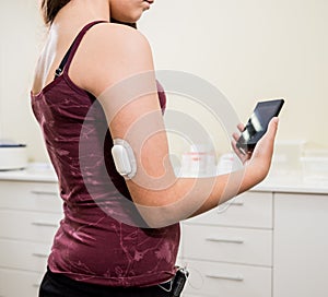 Medical device for glucose check. Continuous glucose monitoring pod. photo