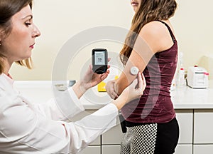 Medical device for glucose check. Continuous glucose monitoring pod. Modern wireless technology. photo