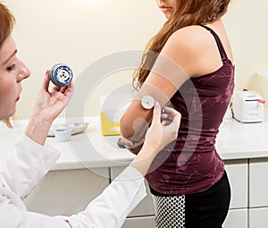 Medical device for glucose check. Continuous glucose monitoring pod. photo