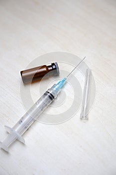 Medical device for injecting and a bottle filled with medicinal liquid