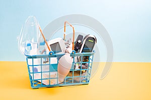 medical devices for home use in a small blue shopping basket