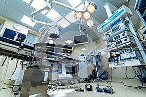 Medical devices and industrial lamps in surgery room of modern hospital. Interior hospital design concept