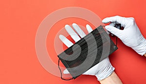 Medical disposal, lab gloves - Virus protection equipment on red background. Infections prevention CoronaVirus pandemic