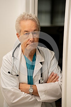 Medical doctor with arms crossed