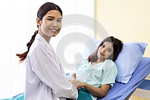 Medical doctor hold patient hand