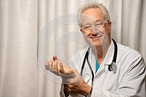 Medical doctor holding up empty space in hands