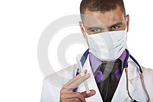 Medical doctor with injection, stethoscope, mask