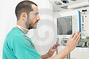 Medical doctor making ECG test in hospital