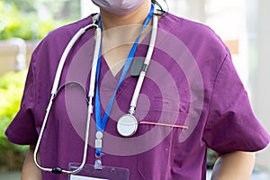 Medical doctor or nurse with Stethoscope and sphygmomanometer measures blood pressure of patients
