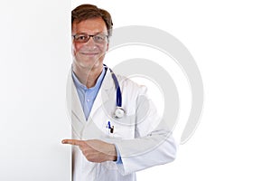 Medical doctor pointing with finger at ad space