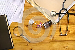 Medical doctor's office desk top view as copy space