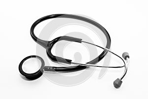 A medical doctor`s stethoscope on a white background.