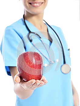 Medical doctor showing apple