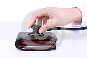 Medical doctor stethoscope examine a wallet