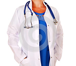 Medical doctor in uniform with stethoscope standing isolated on white background