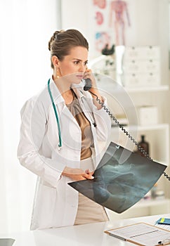 Medical doctor woman with fluorography photo