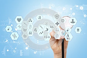 Medical doctor working with modern computer virtual screen interface. Medicine technology and healthcare concept.