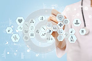 Medical doctor working with modern computer virtual screen interface. Medicine technology and healthcare concept.