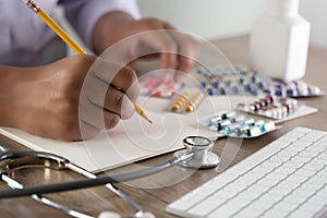 Medical doctor writing prescription physician with stethoscope prescribing treatment
