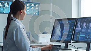 Medical doctors working in hospital office making computer research. Medicine, healthcare and technology concept.