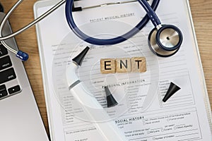 Medical documents, equipments and word ent collected with wooden cubes