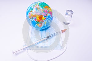 Medical drug vaccine syringe needle hypodermic injection treatment on map world ,Medical concept tourism travel care diseases