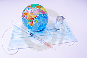 Medical drug vaccine syringe needle hypodermic injection treatment on map world ,Medical concept tourism travel care diseases