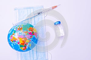 Medical drug vaccine syringe needle hypodermic injection treatment on map world ,Medical concept tourism travel care diseases