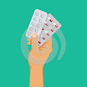 Medical drugs addiction, hand holding blisters with pills, antidepressant dependence, vector illustration. photo
