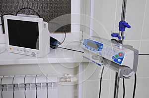 The medical equipment at a bed of the patient.