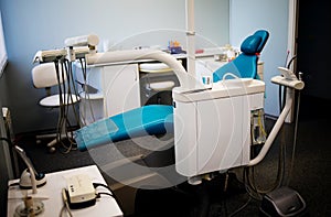 Medical equipment and dentistry concept - interior of a new modern office of a dental clinic with a chair