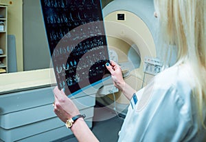 Medical equipment. Doctor in MRI room at hospital