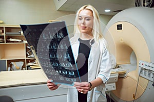 Medical equipment. Doctor in MRI room at hospital