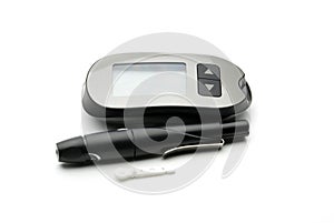 Medical equipment for measuring the level of blood glucose with lancing pen device on white background