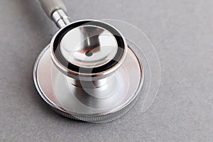 Medical equipments including stethoscope medicines background, top view flat lay