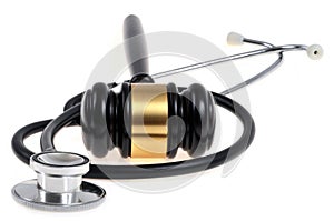 Medical error concept with a stethoscope and a judge gavel on white background