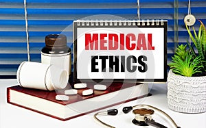 Medical ethics. Text inscription in the plate. Rules and norms